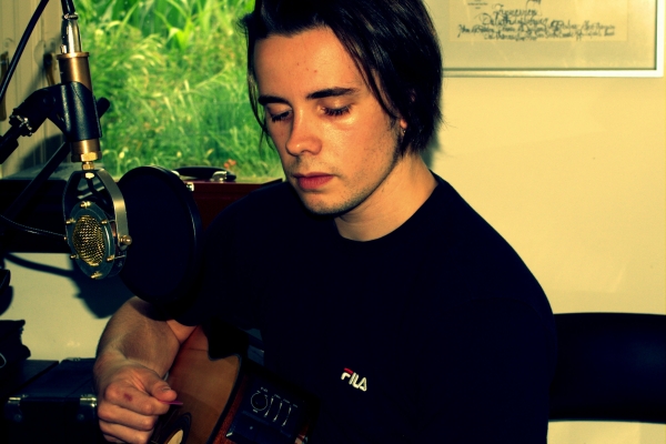Jack Belsten playing acoustic